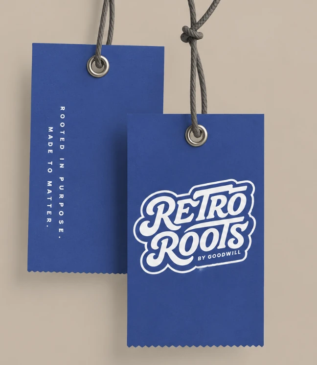 Mockup of two blue hangtags on cords: one with the white Retro Roots logo, the other reading Rooted in purpose. Made to matter.