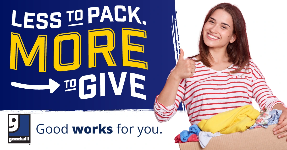 College concept, 1200 by 628: Less to pack. More to give. in white and yellow on a blue brushed panel, the Goodwill logo, Good works for you., and a smiling woman giving a thumbs-up beside a box of clothes.