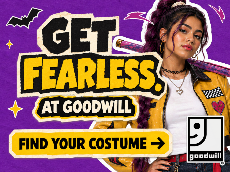 Get Fearless at Goodwill, woman in a yellow jacket with a bat on purple.